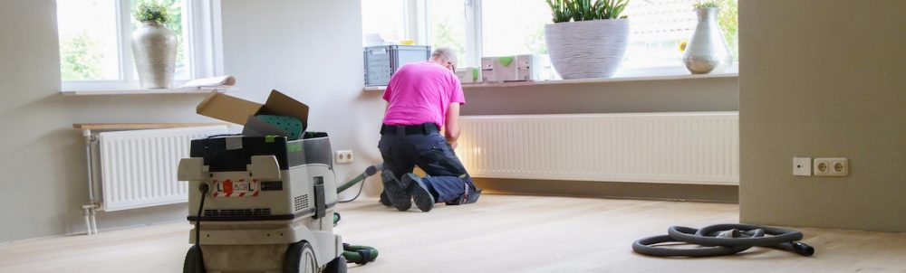 Recoating of a wood floor or parquet in Amsterdam. Wood floor sanding in Amsterdam